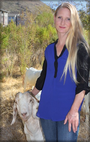 Elizabeth Reynolds with a goat