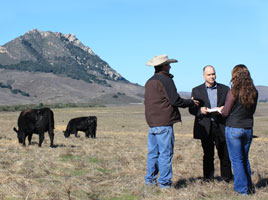 Aaron Lazanoff and animal science student with USDA auditor