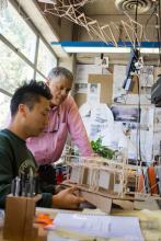 Photo of architecture professor Tom Fowler and student Photo of professor working with architectue student