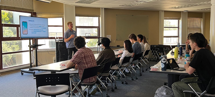 career counselor presents in a room of students