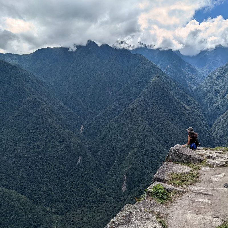 A student enjoys the view at Machu Picchu.