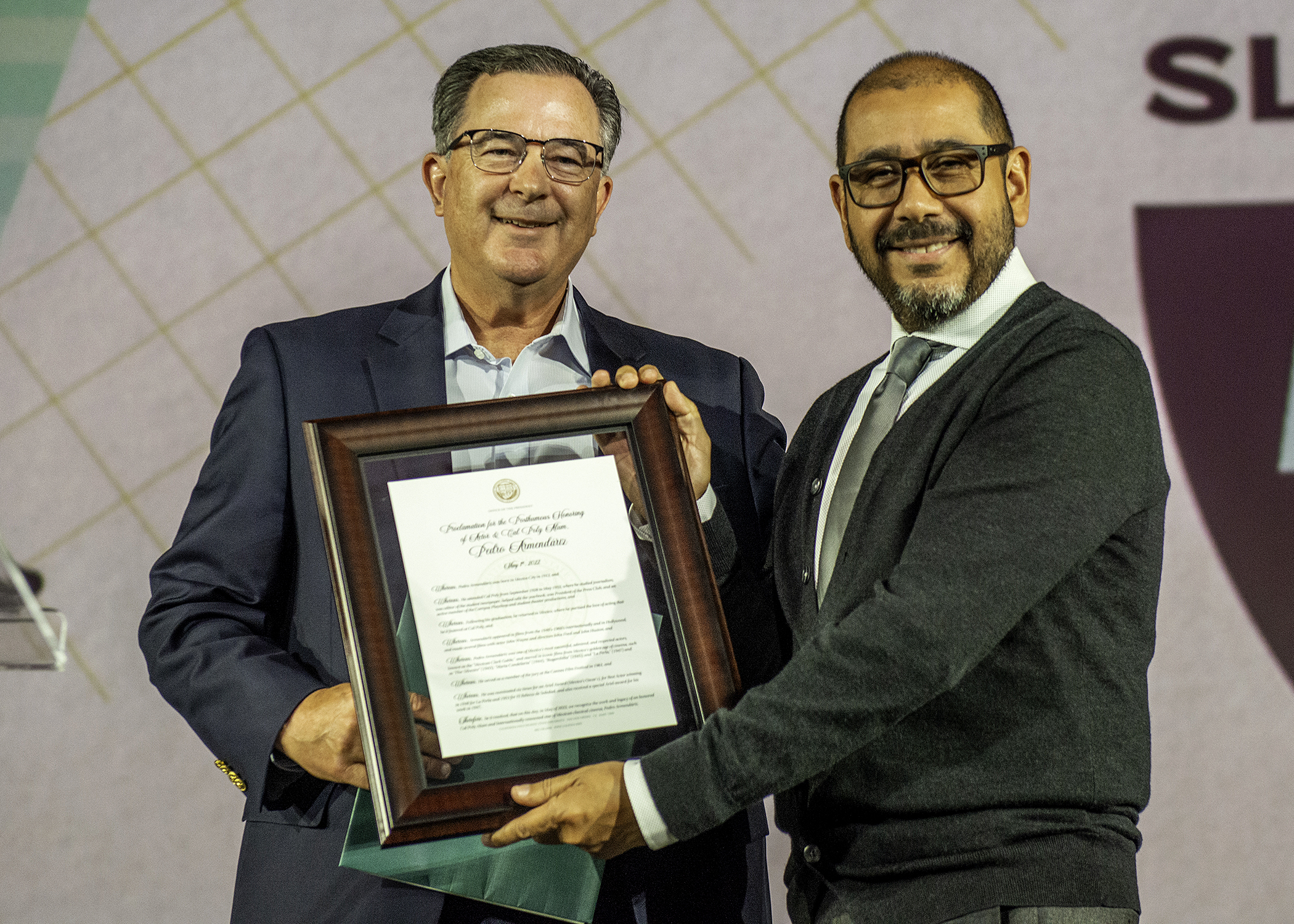 Dean Phillip Williams presenting an award to Pedro Armendáriz