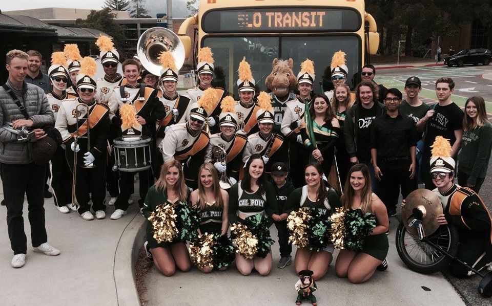 Mustang Spirit Team in front of a SLO Transit bus