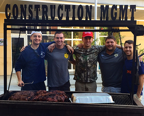 ASCM Students at a bar-b-que