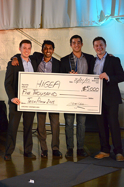 Higea Technologies employees pose with a check for $5,000