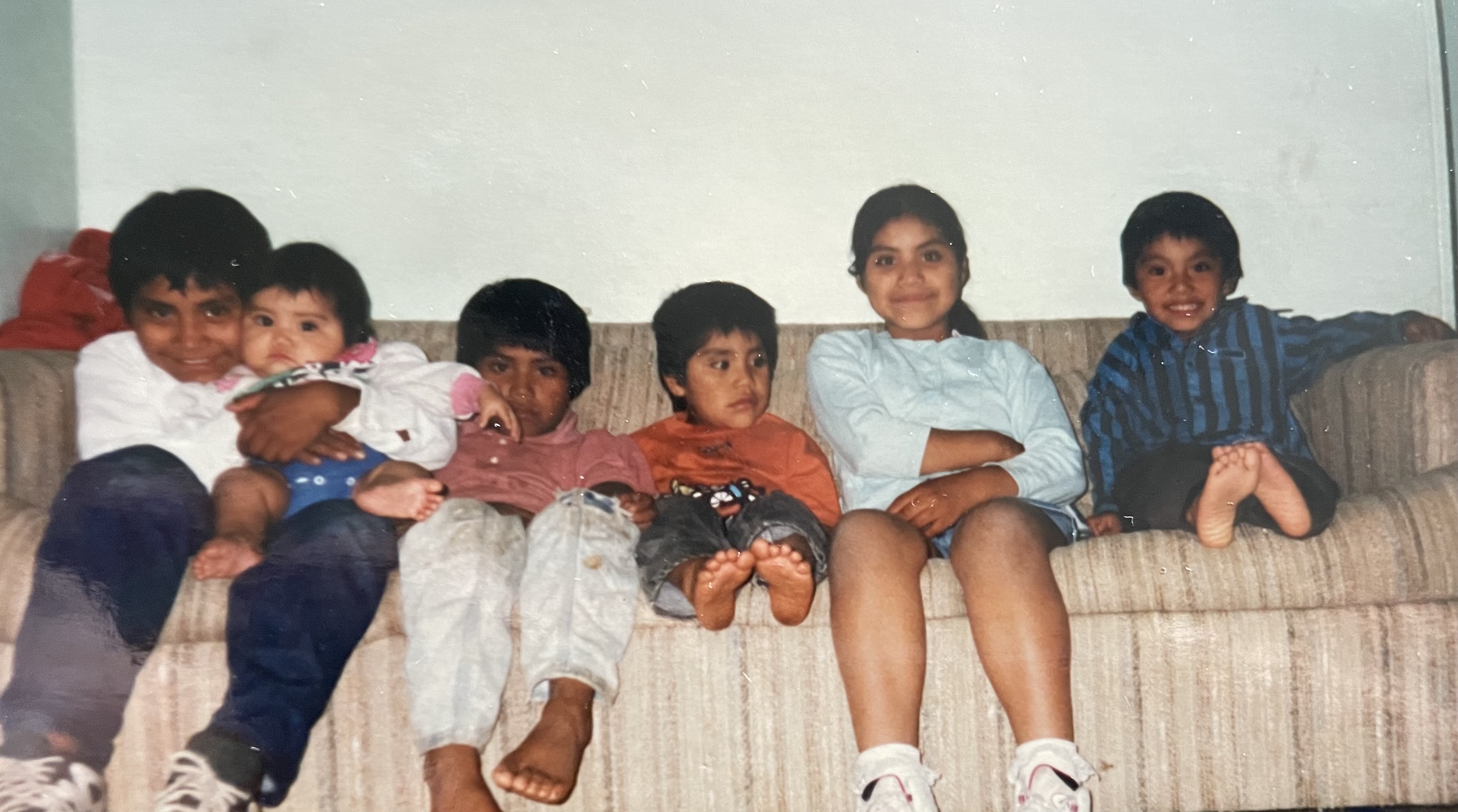 Manuela Cruz (second from right) at home with (from left) her brother Ricardo holding her sister Janet, brothers Eduardo and Rigoberto and cousin Daniel