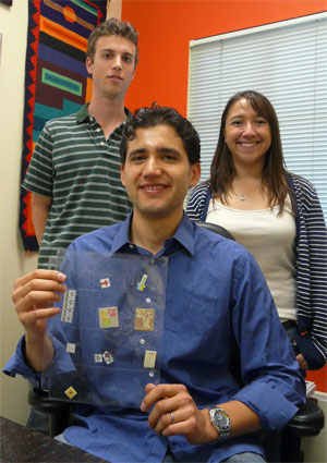 Professor Martinez and students with paper strip prototypes