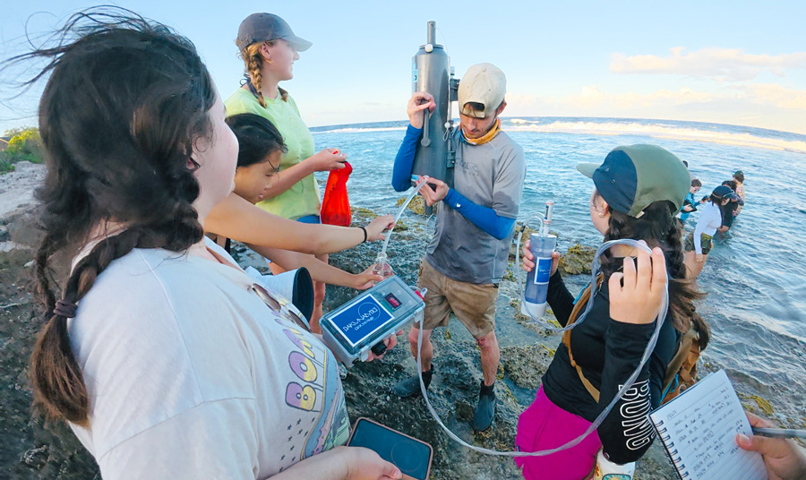 Bailey-French-Polynesia-students with equipment