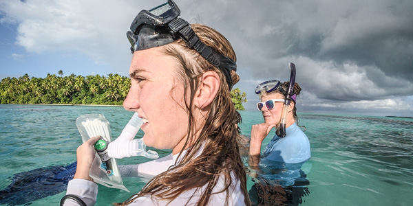 Bailey College student and professor snorkeling in South Pacific waters