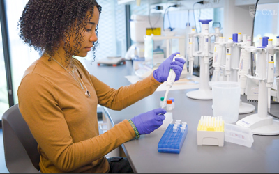 Genesis Glover doing research in lab