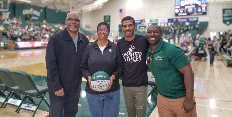 Camille O'Bryant with Cal Poly friends at a basketball game
