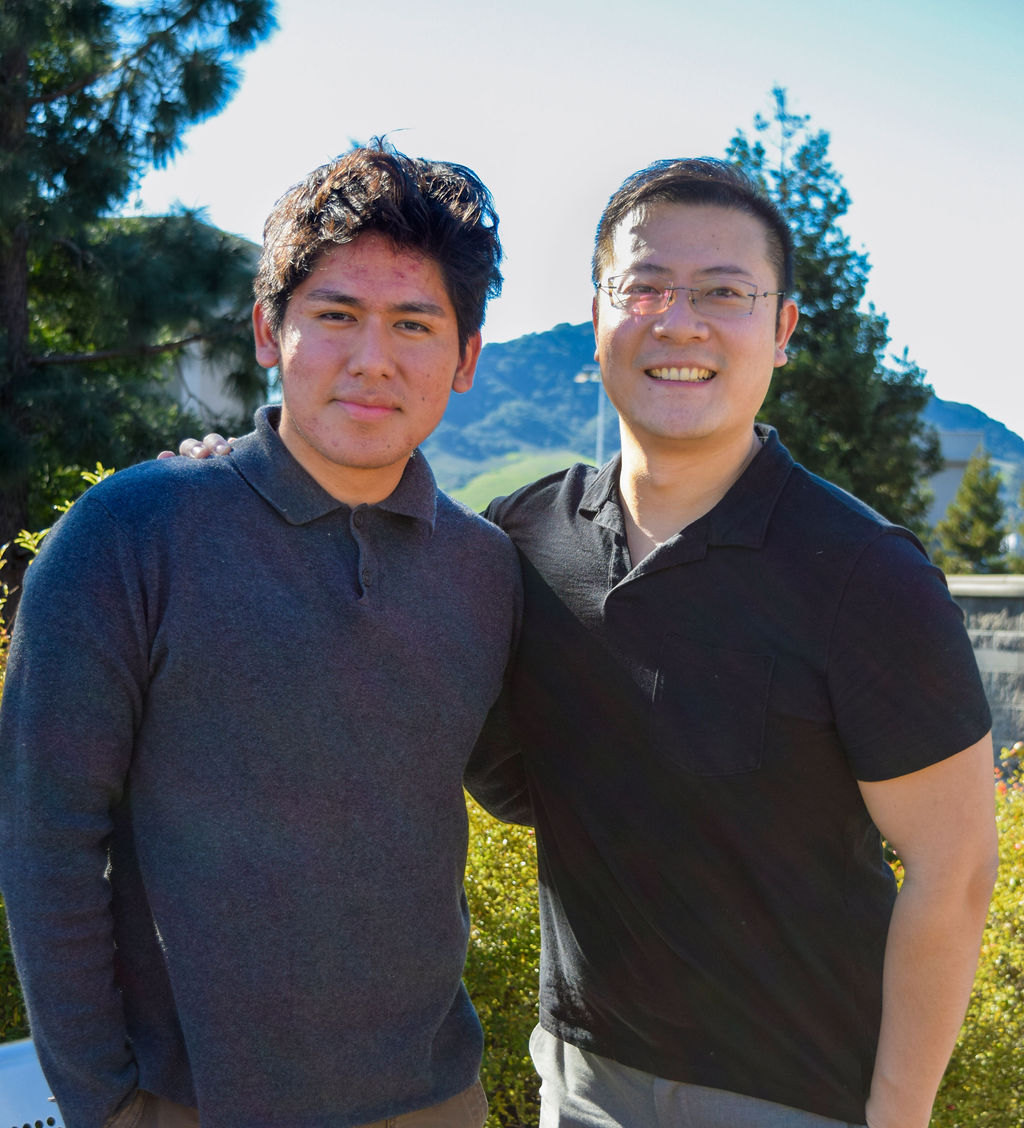 Alexis Carrera with Dr. Long Wang.