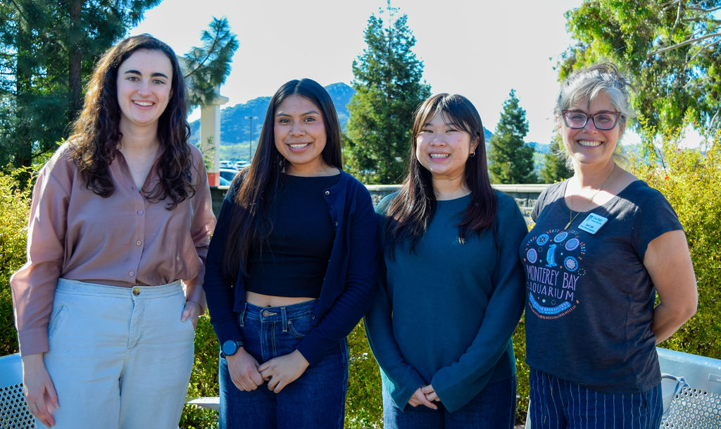 Kelly Hoang and Emily Santos with Dr. Andrea Schuman and Dr. Jane Lehr.