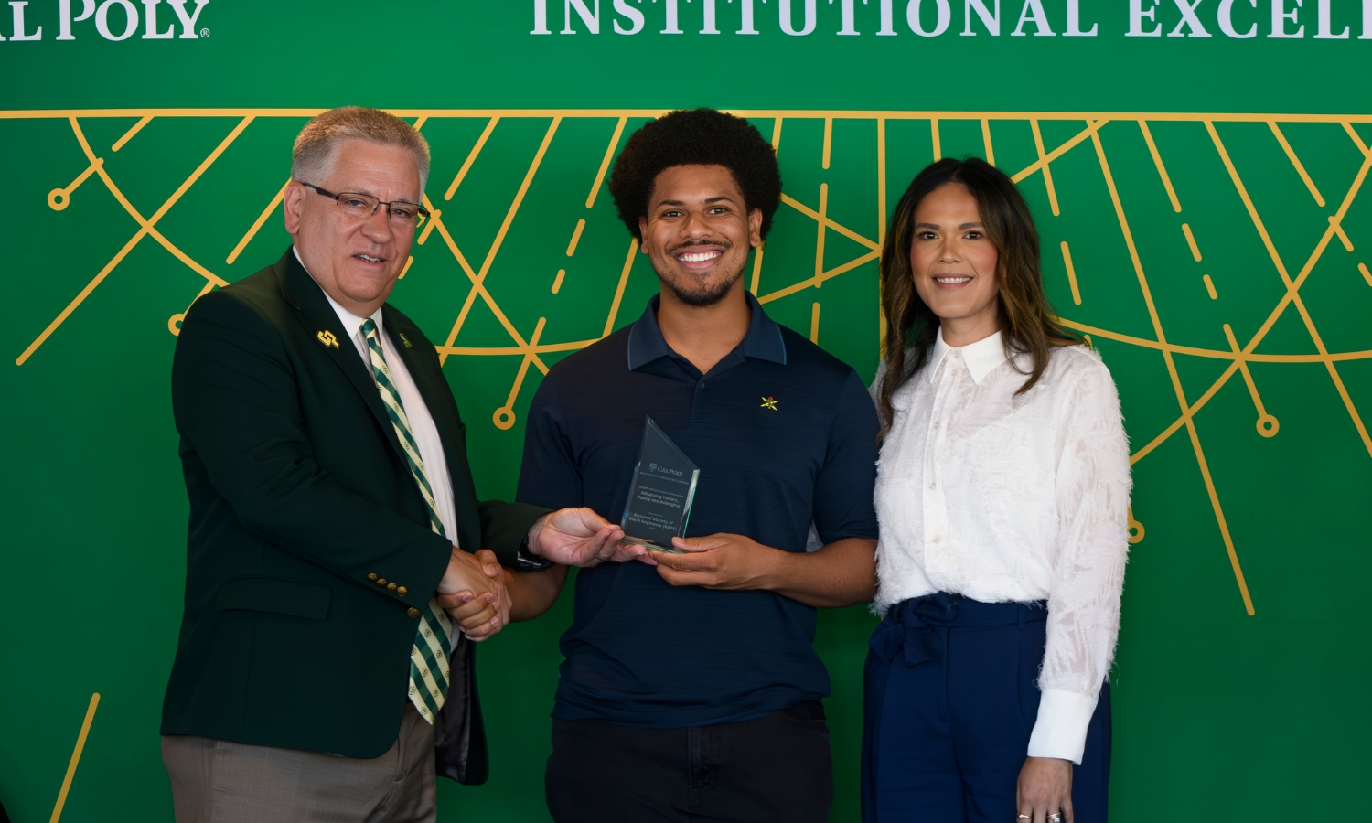 Daniel Reed, President of NSBE, with President Armstrong and Dr. Beya Makekau.