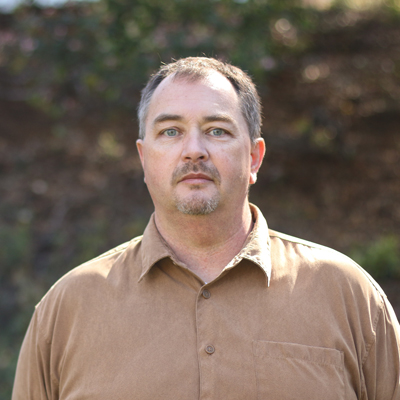 Dr. Chris Den Hartog