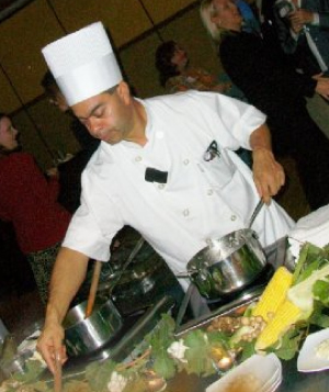 Chef preparing appetizers at Hotel Corque