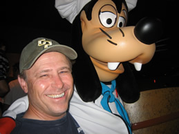 Dr. Hendricks poses with Disney character Goofy