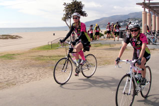 Dr. Goldenberg bikes by the ocean