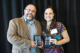 Brian and Jerusha Greenwood pose with awards