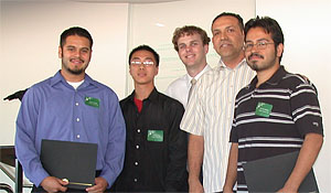 Jose Millan with students at their graduation