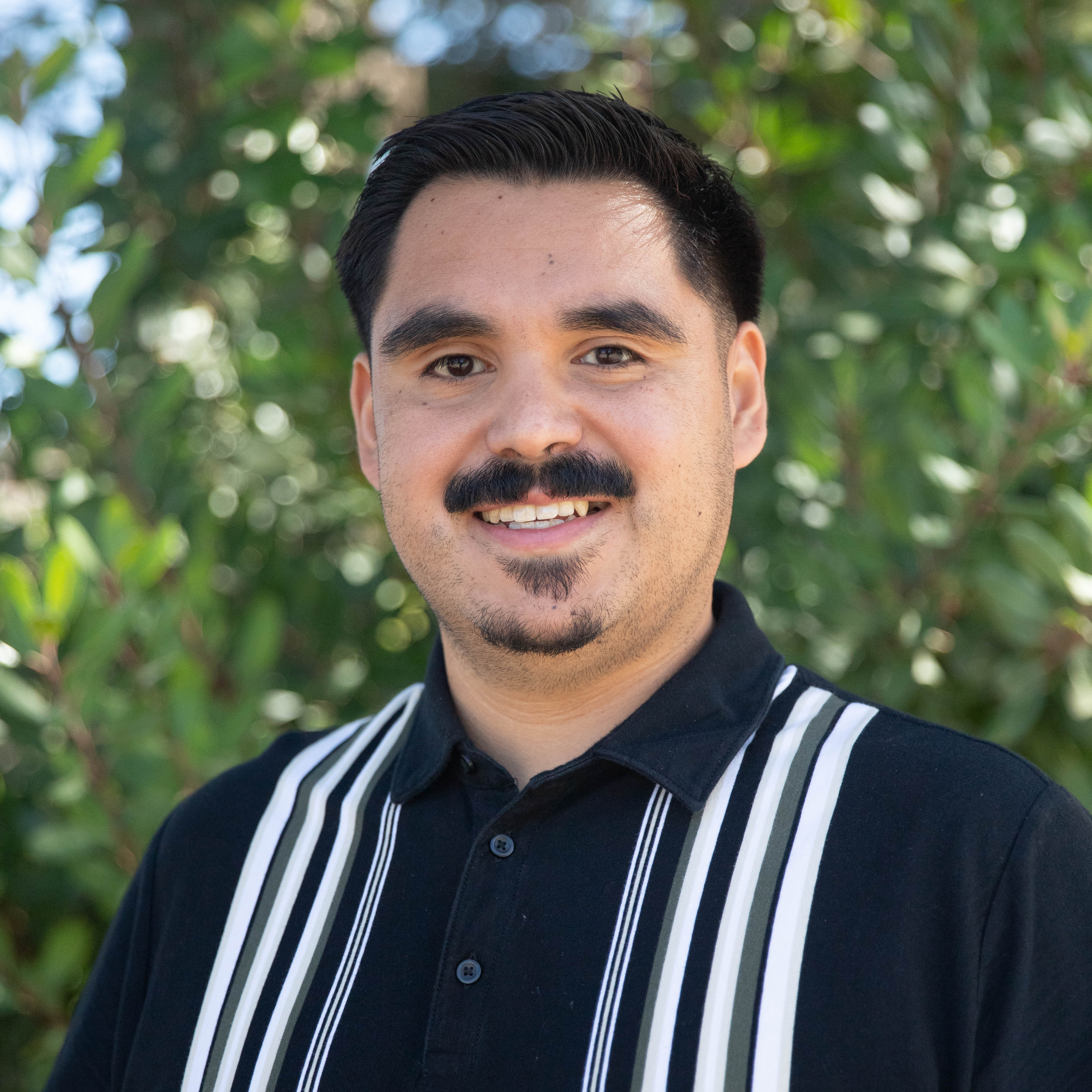 Alejandro Castaneda headshot.