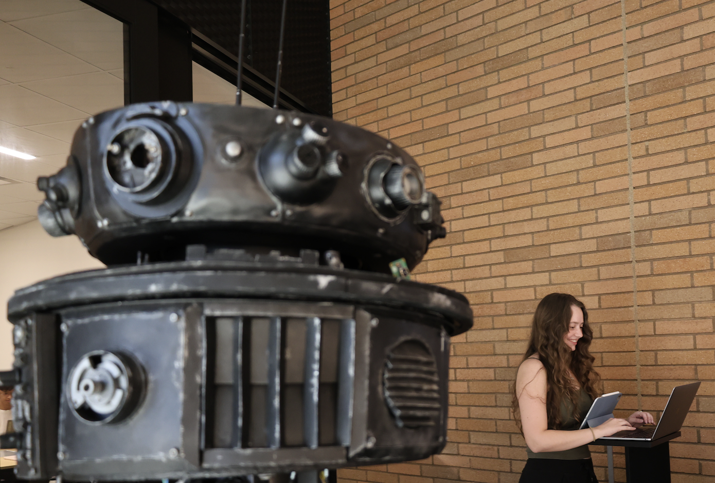 Freya Rust a Liberal Arts and Engineering Studies Student and FRIDA the animatronic droid
