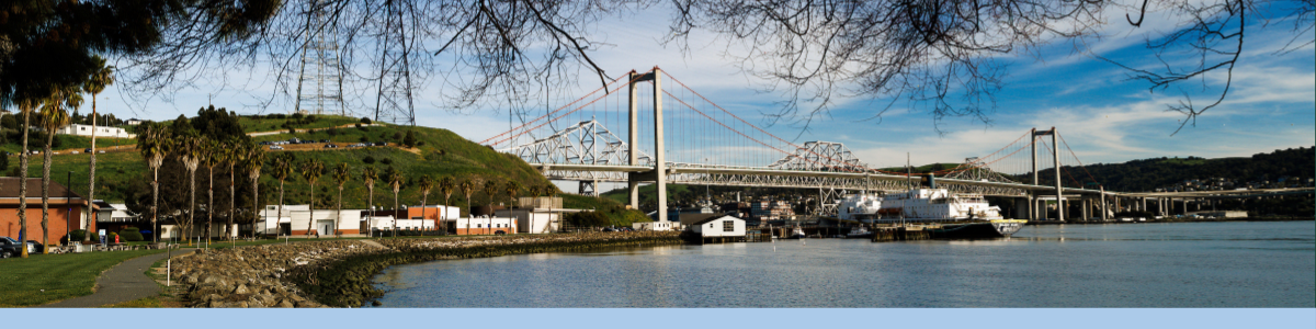 View of the Cal Poly Maritime Academy campus with the Carquinez Bridge behind the Golden Bear.