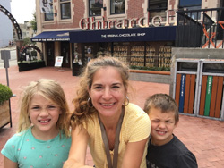 Alicia Fry Davis with her son and daughter in front of Ghirardelli store