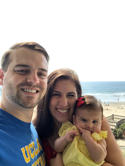 Ariana Montes Moore with her partner and baby at the beach