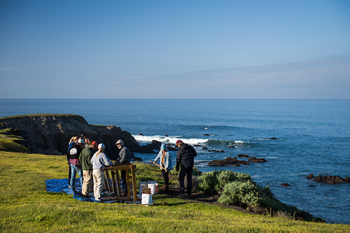  Archaeological Field Methods take part in a Learn by Doing activity near the Pacific Ocean. 