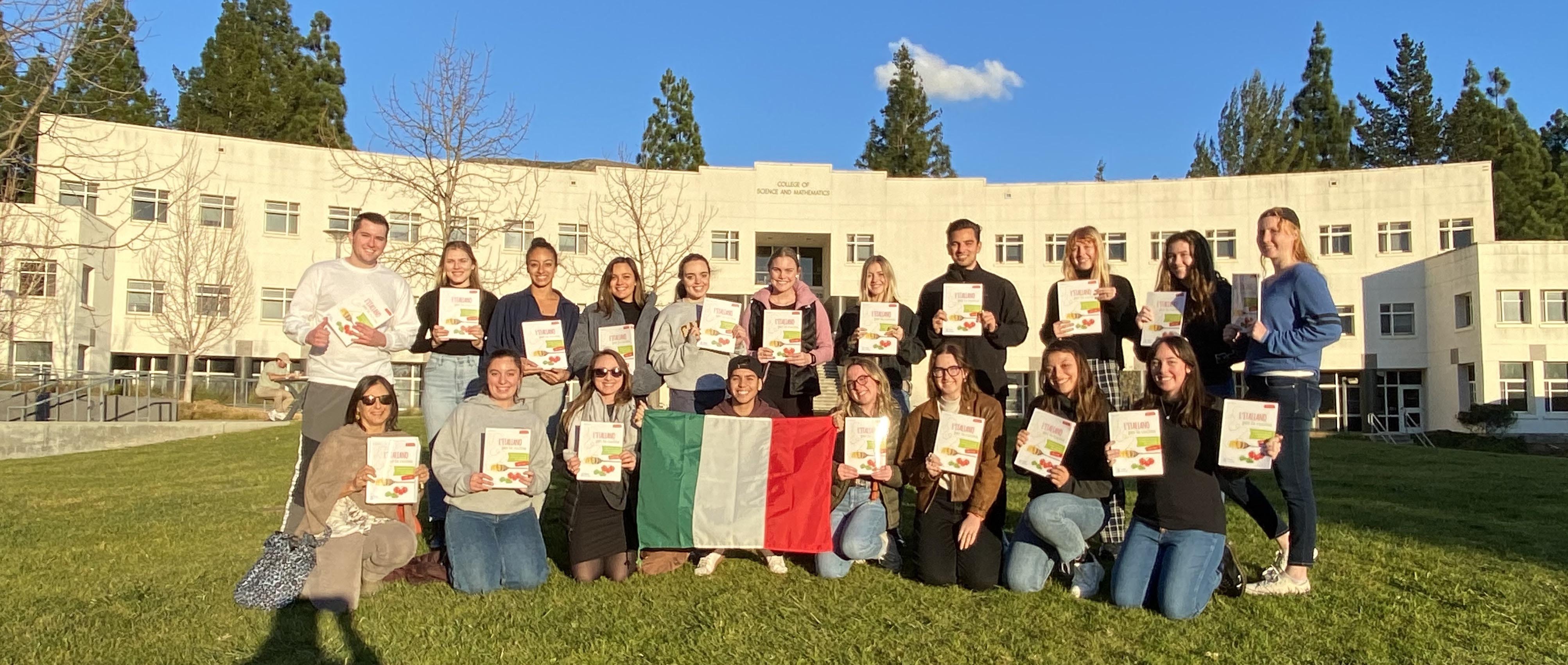 Italian 202 students pose with their textbooks